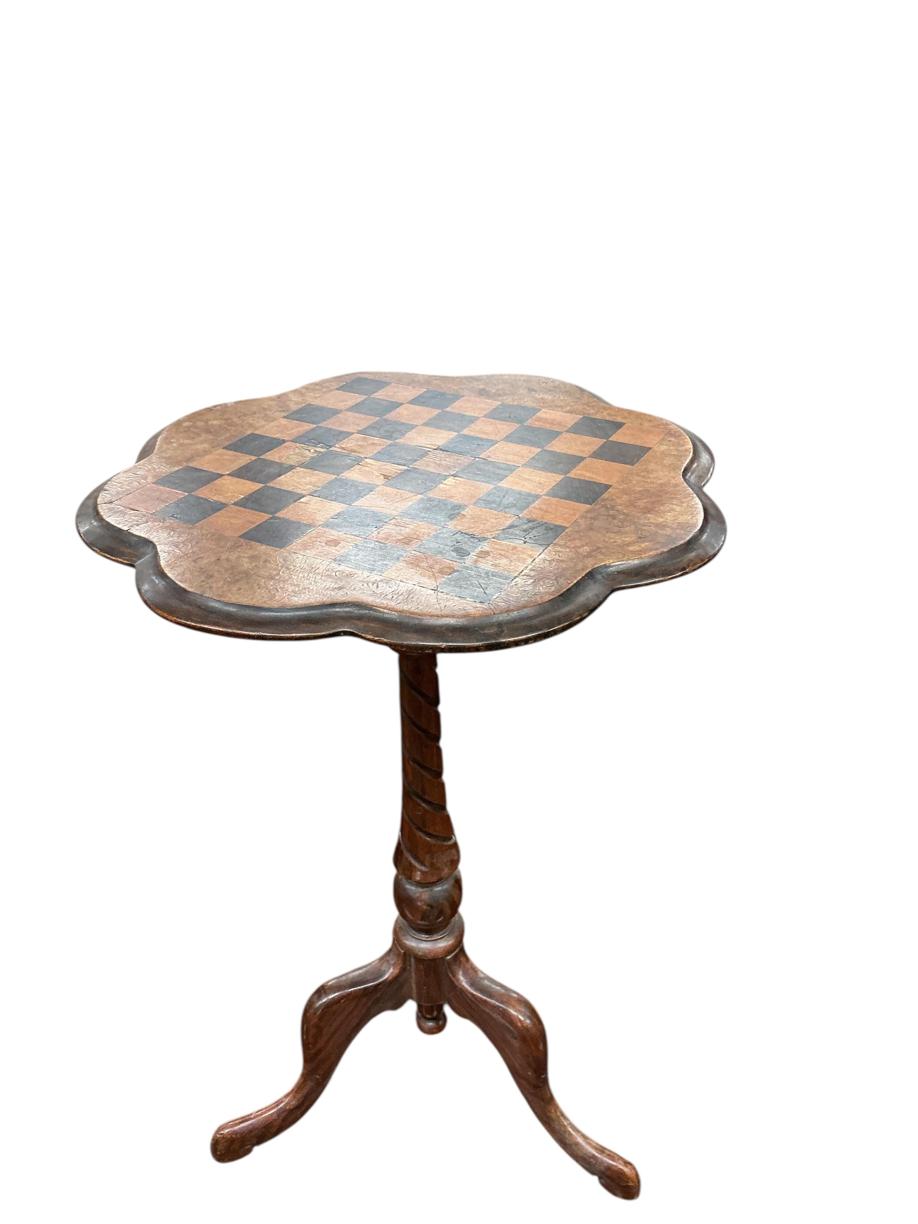 A Victorian burr walnut tripod games table, width 48cm, height 71cm